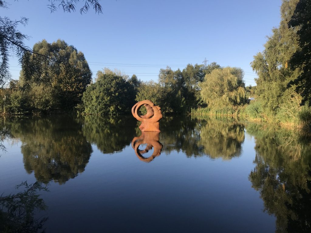 sculpture in a body of water in a park near Dorchester Dorset