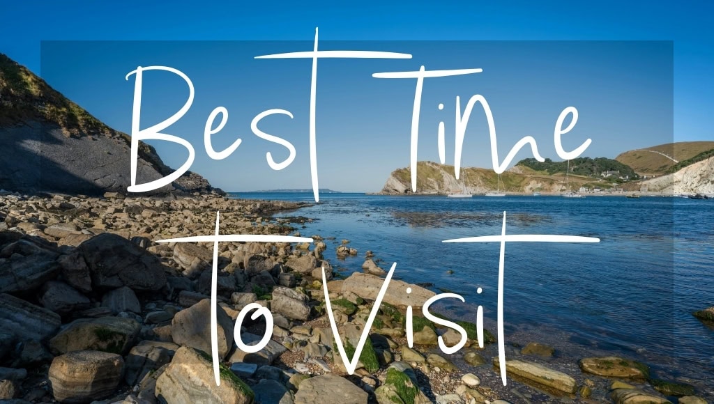 Best Time to Visit: written in white text above a photo of Lulworth Cove in Dorset