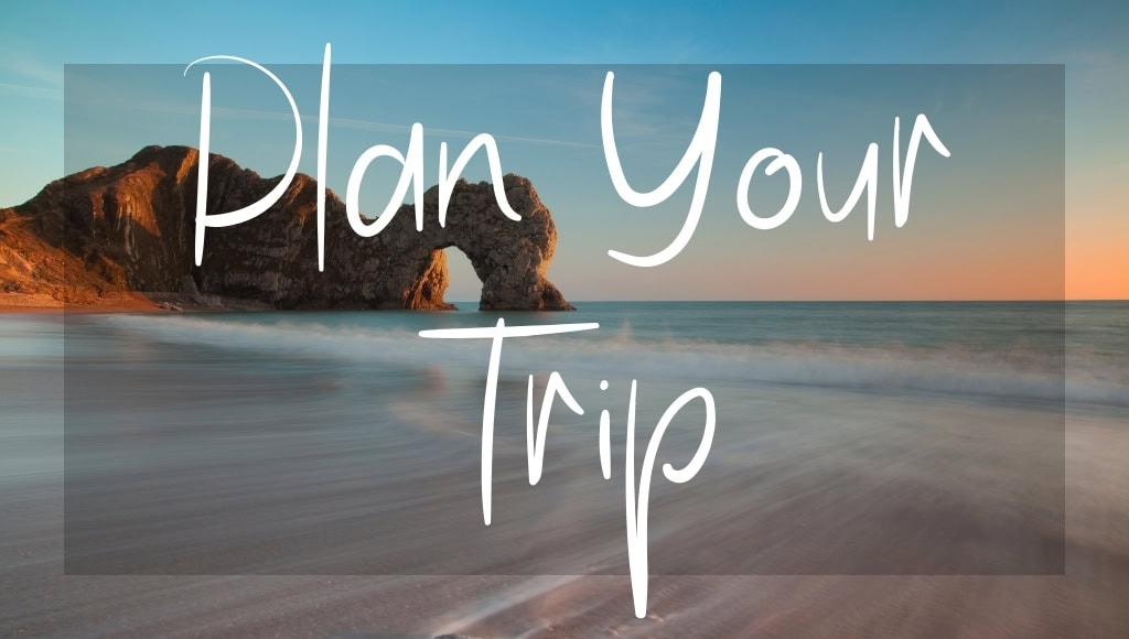 Plan Your Trip: written in white text above a photo of Durdle Door | Dorset Travel Guide