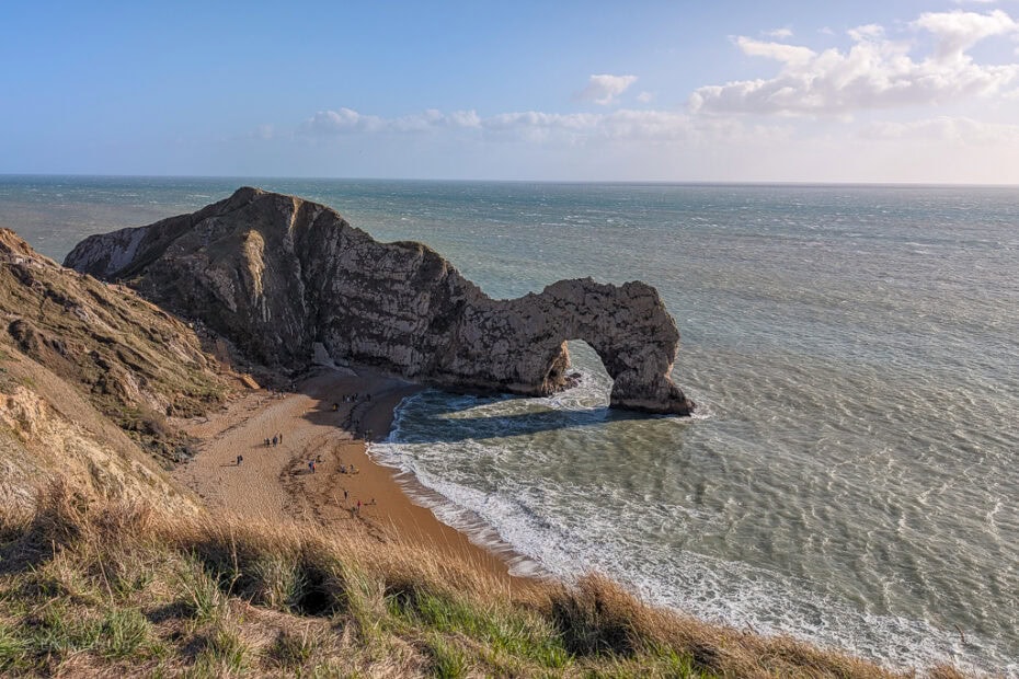 A large rock arch over the sea at Durdle Door